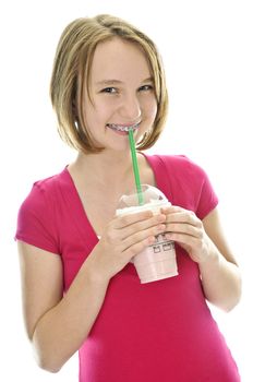 Teenage drinking strawberry milkshake isolated on white background