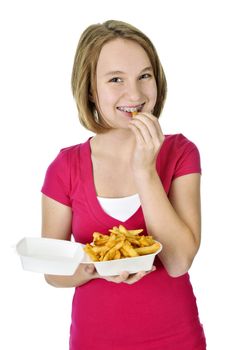 Teenage eating french fries isolated on white background