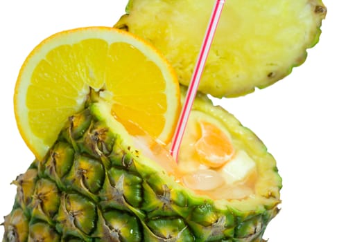 close-up exotic cocktail with pineapple as cup, isolated on white