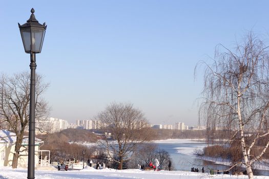Solar Winter Day in Park Kolomenskoe, Torch in Old-time Stiletto, Type On Moscow-river, UPTOWNS