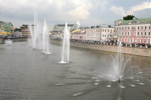 Moscow, Russia, Town Landscape, Evening Type on Fountains in Drainage Channel and Kadashevskaya Quay