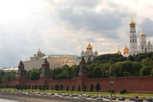 Russia, Moscow, Red Kremlin Wall with Tower and Orthodox Temple on Territory Flint