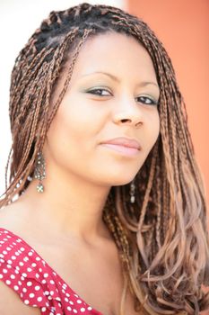 close-up portrait smiling african girl with exotic hairstyle