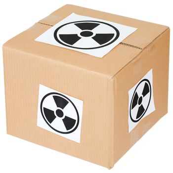 Cardboard box with a radiation hazard sign on white