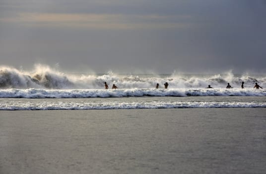 The image of the Indian ocean with the big waves and people