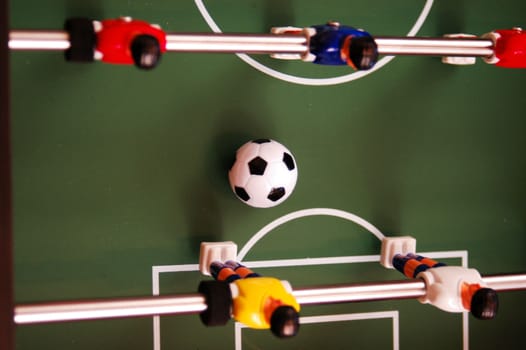 rolling ball on a foosball table