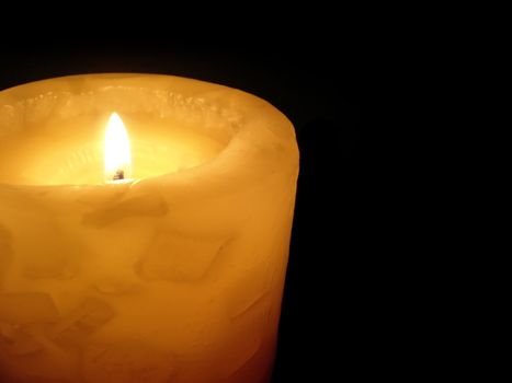 soft candle light on black background