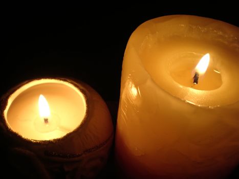 soft candle light on black background