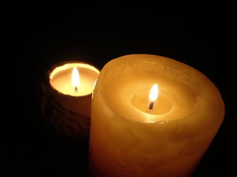 soft candle light on black background