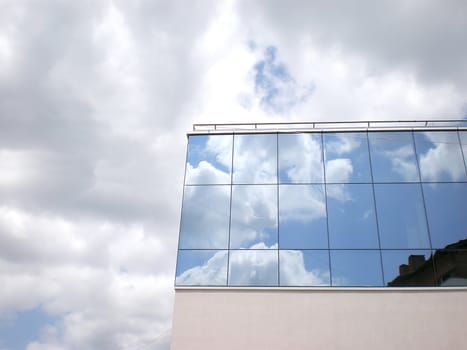 reflected sky on buildings windows