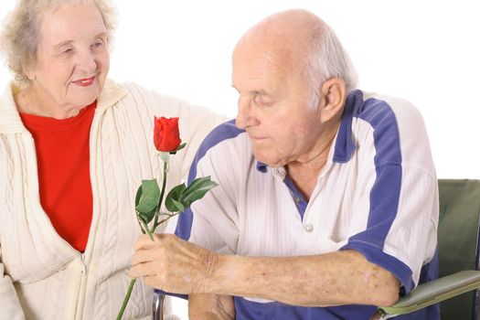 wife giving handicap husband a rose 