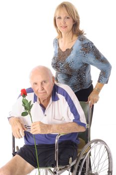 handicap elderly man with younger woman