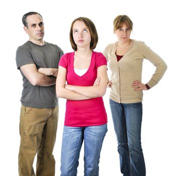 Teenage girl rolling her eyes in front of angry parents