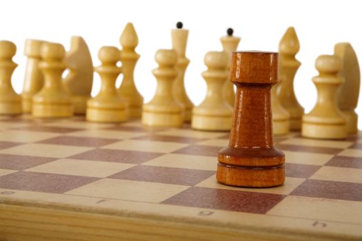 Brown chess rook on a white background