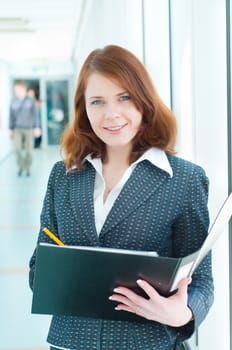 Shot of beautiful business woman in interior