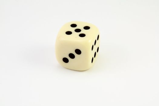 Playing dice, color ivory whit black dots