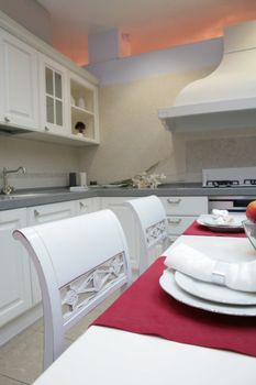 modern kitchen with white furniture, interior