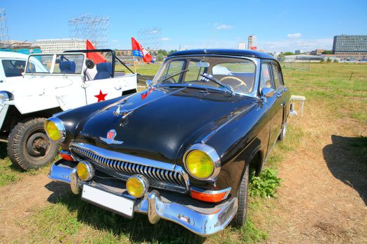 Legendary russian car 60-70-h, black and shining, Volga GAS - 21, editorial use only