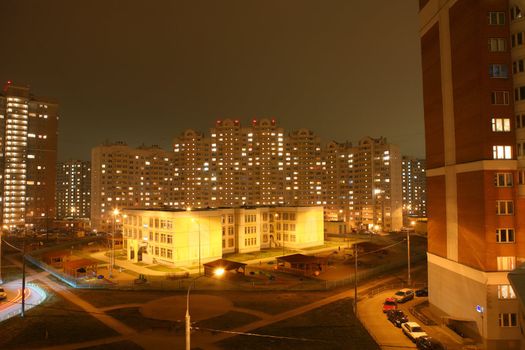 usual moscow courtyard on outskirts of the big city winter at night