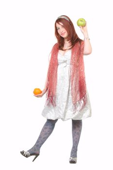 Smiling woman with fruits in hands, with copy-space