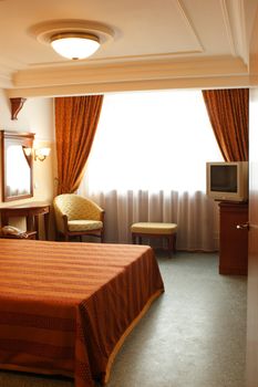 Interior, Bedroom in Red Color with Mirror and TV