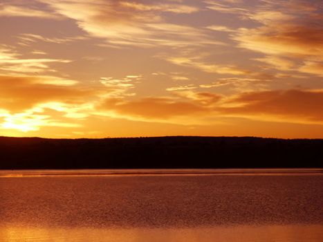 Orange Sunrise On a Lake in Colorado