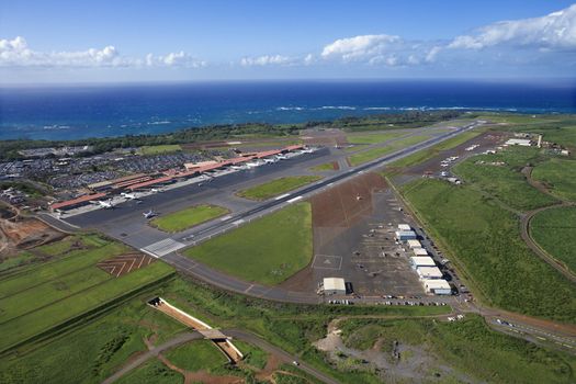 Aerial view of Maui, Hawaii airport with Pacific ocean.