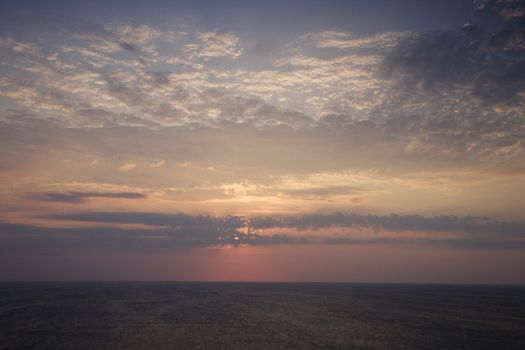 Scenic Bald Head Island North Carolina landscape of sunrise over ocean.