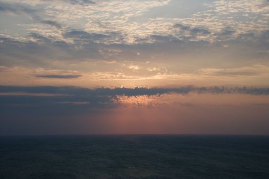 Scenic Bald Head Island North Carolina landscape of sunrise over ocean.