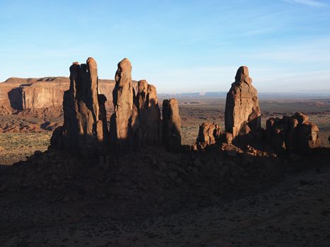 Rock formations in southwest landscape of Monument Valley.