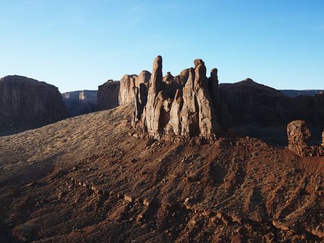 Buttes in southwestern desert landscape of Monument Valley, Utah.