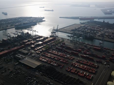 Aerial view of dock with cargo containers for shipping in Los Angeles, California.