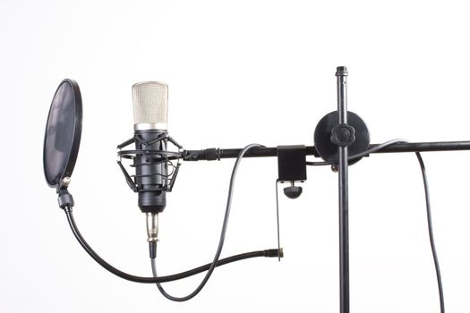 studio microphone on a stand on white background