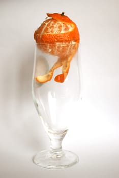 orange mandarine with glass ready to be juiced