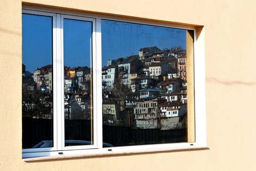 city view with old houses through a window Veliko Turnovo Bulgaria