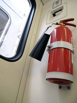 The fire extinguisher in the metro car. Taken in Moscow metro on June 2010, Russia                               