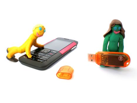 plasticine people figures with phones and usb flash on white background