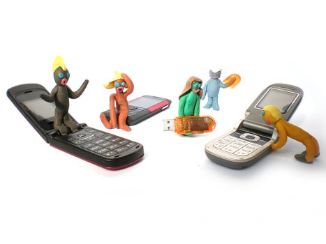 plasticine people figures with phones and usb flash on white background