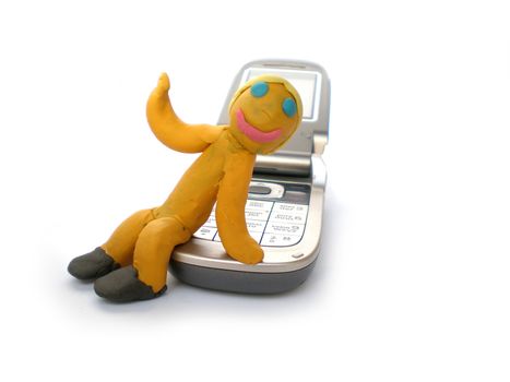 plasticine man figure with phone on white background