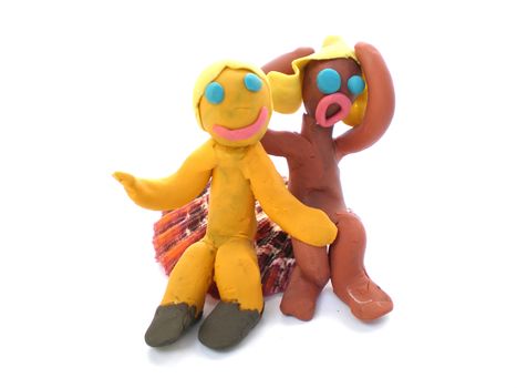 plasticine people figures saying hi on white background