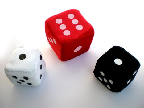 red, black and white dice isolated on white background