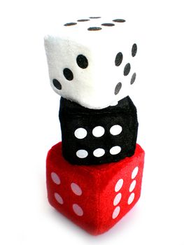 red, white and black dice up in a column  