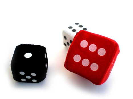 red, black and white dice isolated on white background