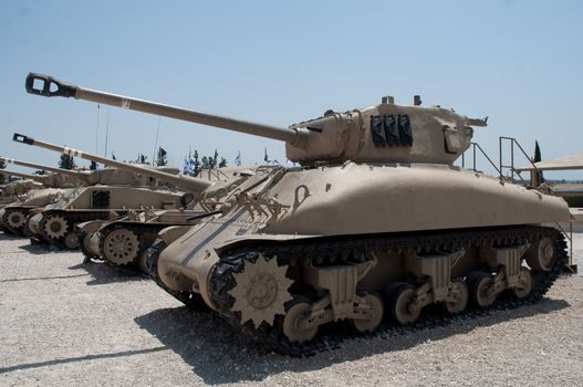 Old tanks against the blue sky . Israel, Latrun.