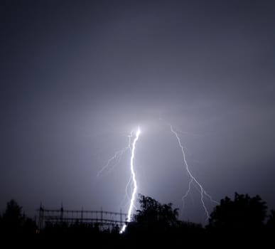 Lightning striking at a power station.