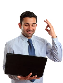 Businessman with laptop computer showing okay hand sign, approval, excellent, exceptional, recommendation, etc.  White background.