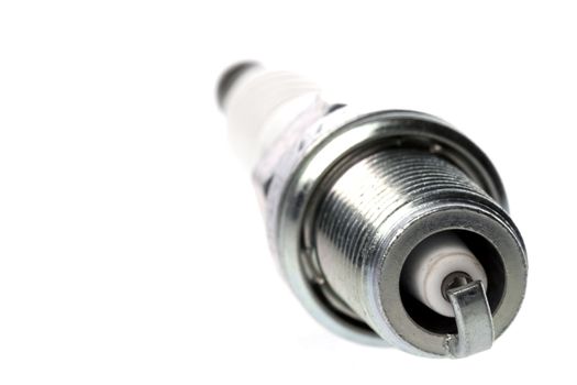 Isolated image of a spark plug.