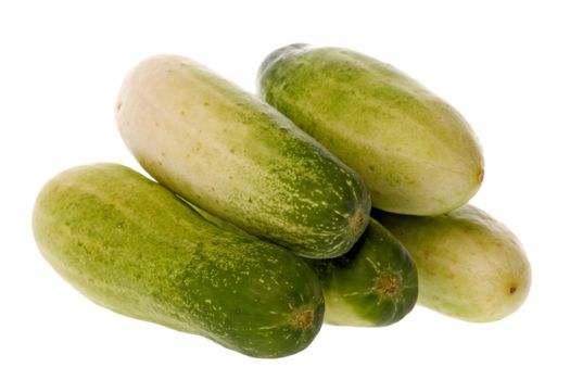 Isolated macro image of baby cucumbers.
