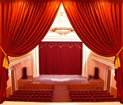 red window shades on a background a hall