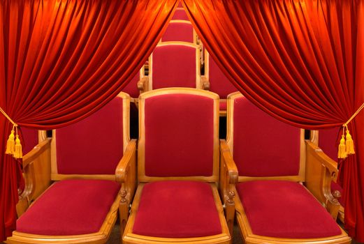 red window shades on a background a hall